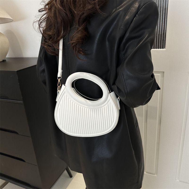 Round bag with embroidered double handle stylish bags